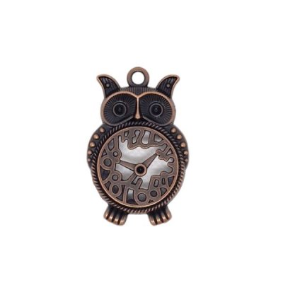 metalldekoration klocka antikkoppar